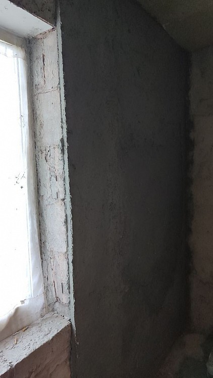 20mm hempcrete plaster covering old breeze block